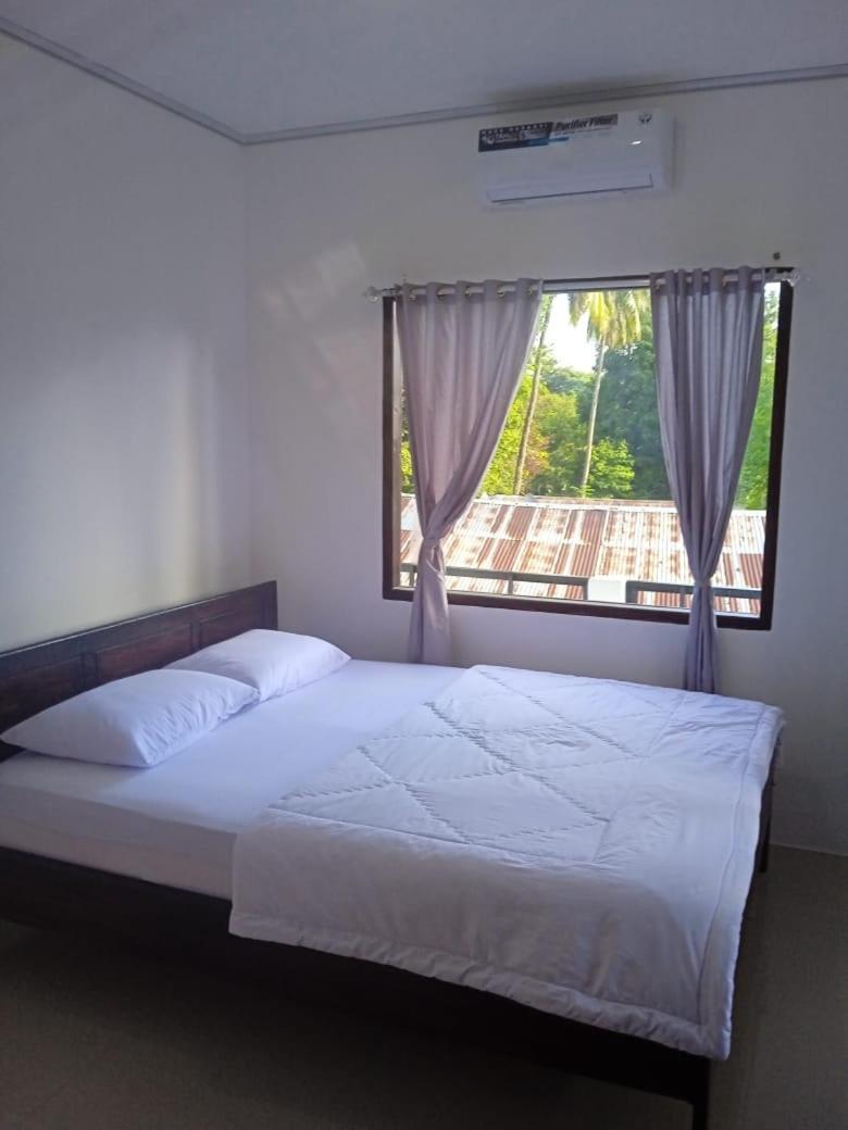 Riung Tiga Empat Tujuh Guesthouse 外观 照片